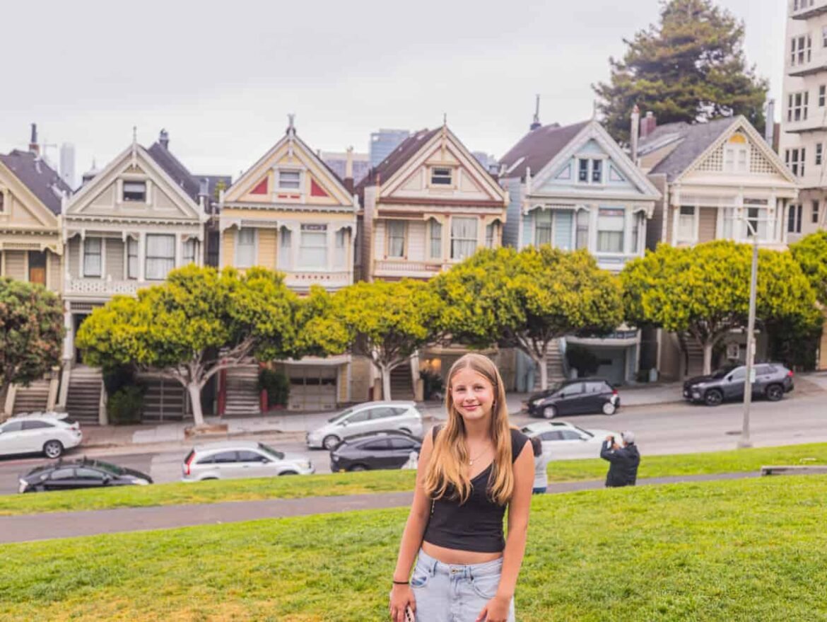 girl in front of painted ladies