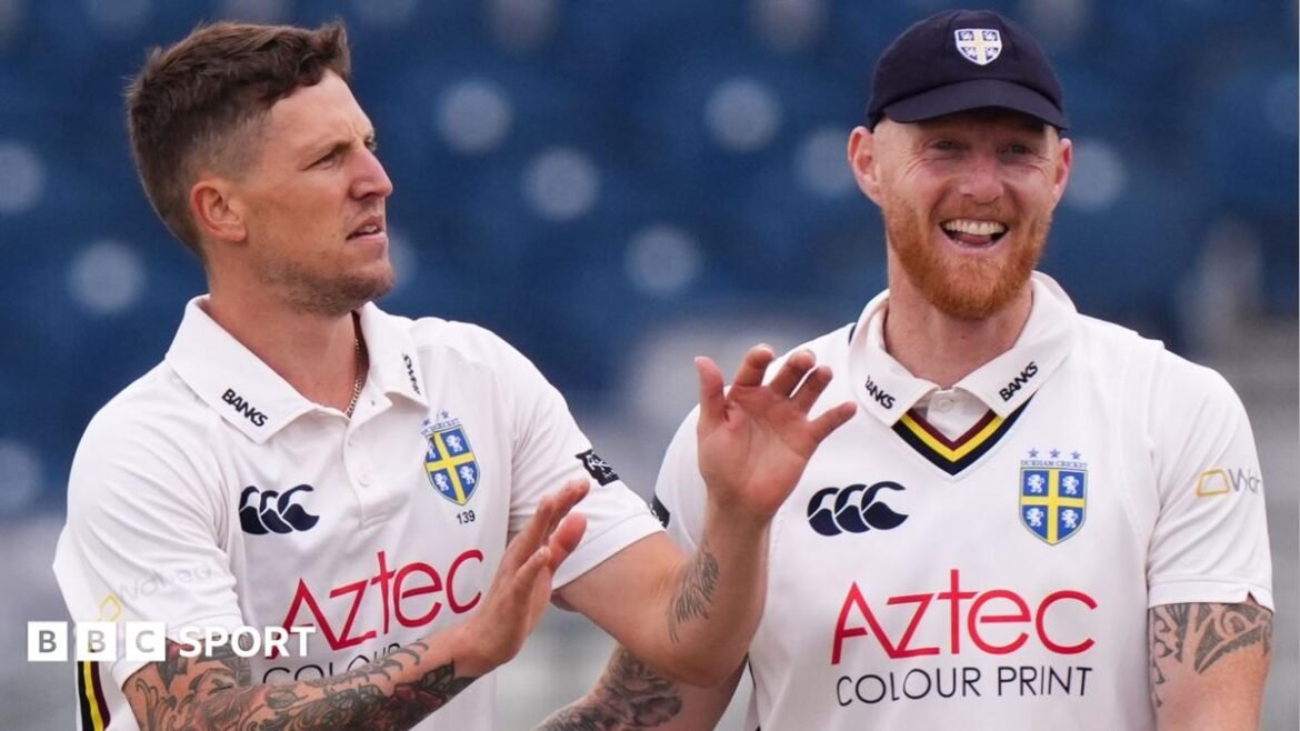 Brydon Carse and Ben Stokes smiling in Durham kits during the win over Gloucestershire