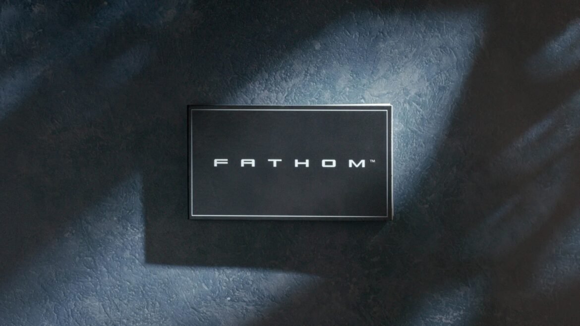 a black plate that says Fathom on a dark gray background
