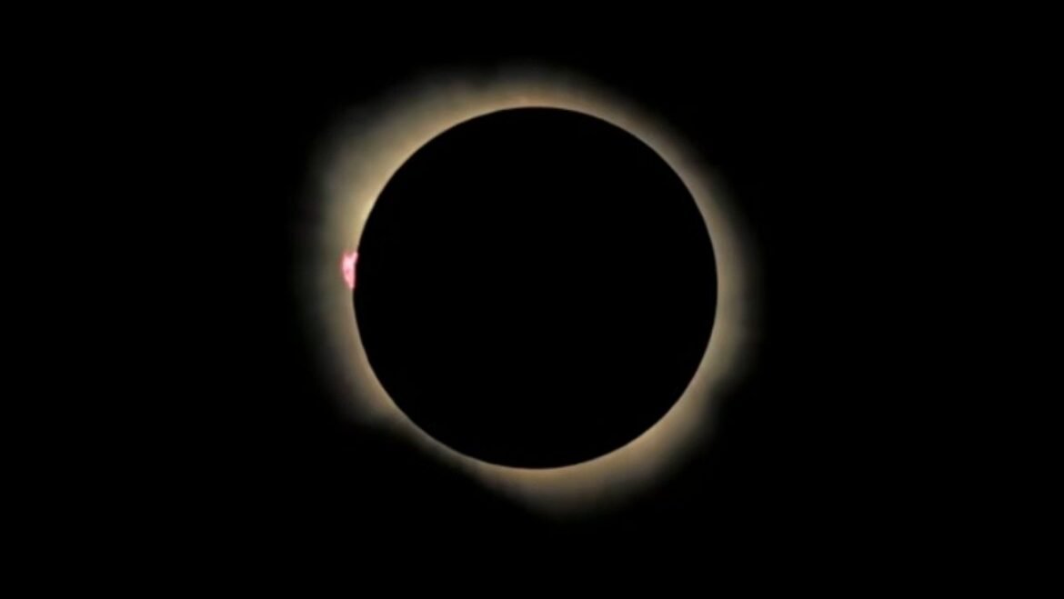 The sun looks like a white diamond ring behind the moon in this total solar eclipse image