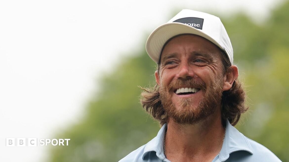 Tommy Fleetwood smiles on the first tee