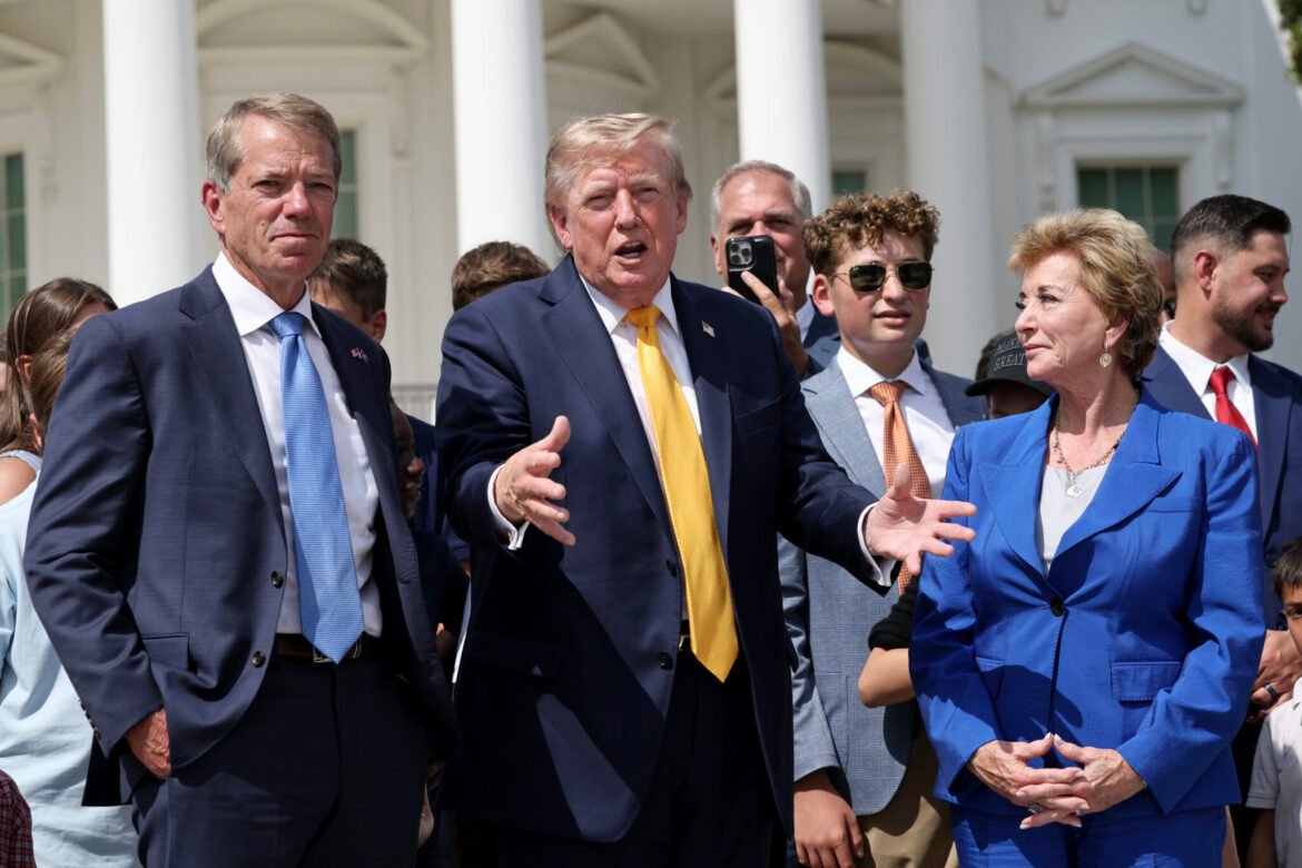 President Donald Trump shows helipad construction on the South Lawn of the White House after an event in the Rose Garden on Aug. 24, 2026. Nebraska Gov. Jim Pillen, left, and U.S. Education Secretary Linda McMahon are on either side of Trump. (Photo by Win McNamee/Getty Images)