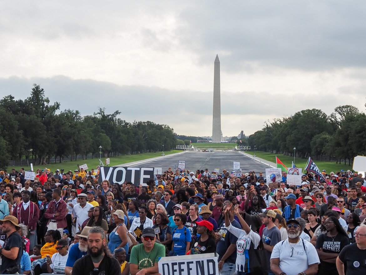 Demonstrators gathered at the Lincoln Memorial Reflecting Pool in Washington, D.C., on Friday, Aug. 28, 2026, marking the 63rd anniversary of the March on Washington for Jobs and Freedom where the late civil rights leader Rev. Martin Luther King Jr. delivered his "I Have a Dream" speech. (Photo by Ashley Murray/States Newsroom)