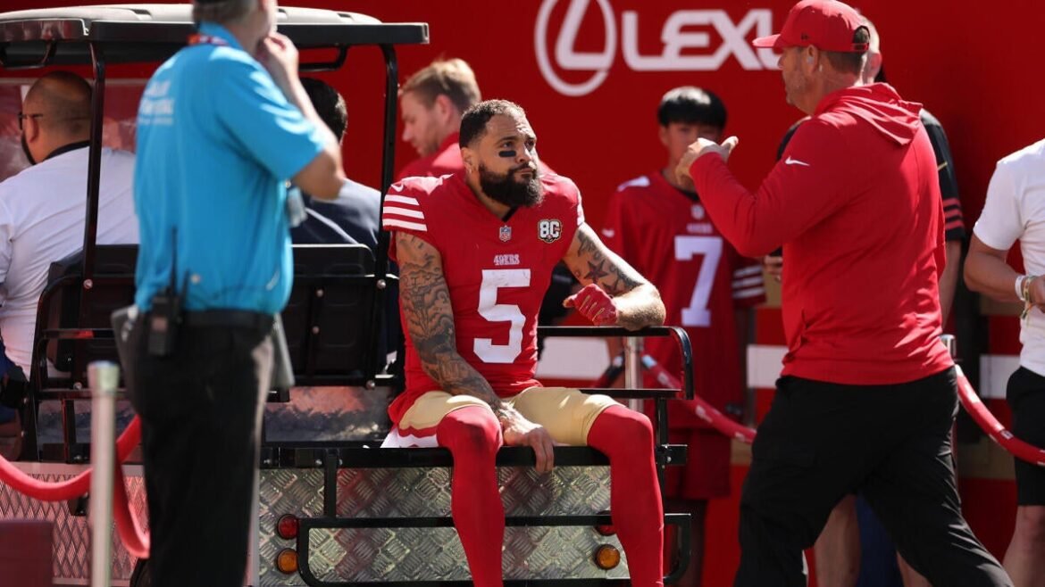 49ers Mike Evans ruled out with injury after taking a hit against Cardinals