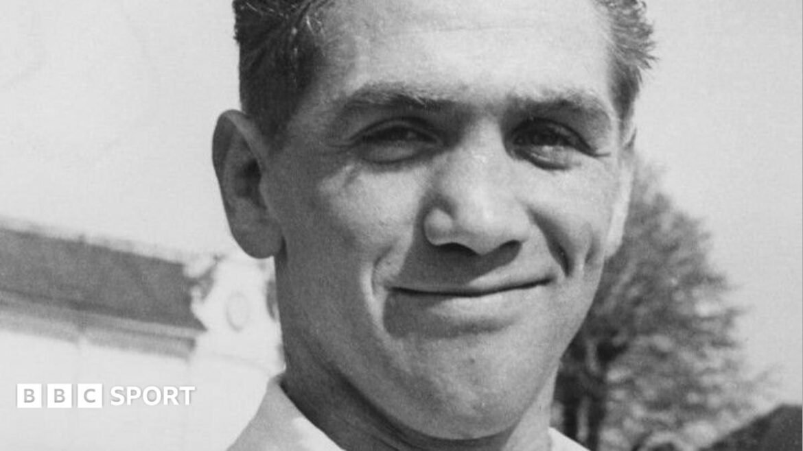 A black and white headshot of Alan Brown