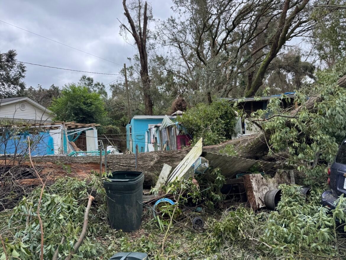 A tree crushed Cher Stanturf's home, completely ripping a wall off the front of it. The tree landed on her car, too. Hurricane Isaias wreaked havoc on the community on Oct. 9, 2026.