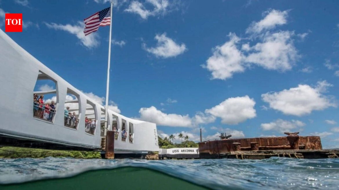 In 1961, Elvis Presley raised $65,000 toward the USS Arizona Memorial; a year later, the 184-foot structure opened above the Pearl Harbor wreck, where more than 900 crewmen remain entombed and oil still leaks