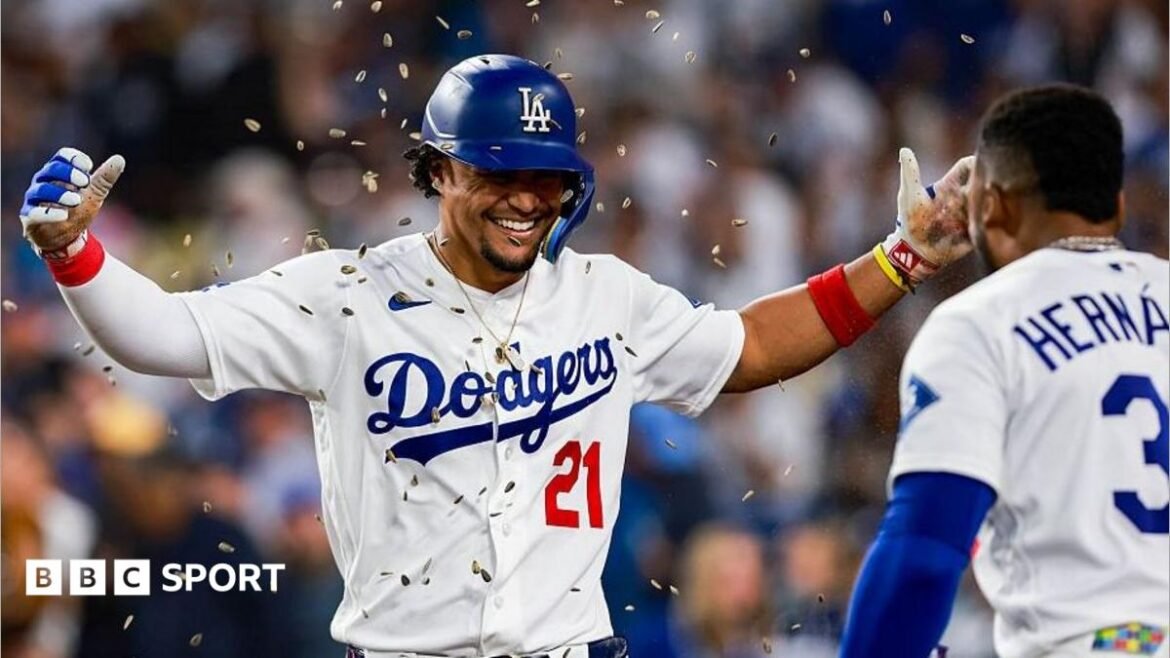 Santiago Espinal celebrates with his Los Angeles Dodgers team-mate Teoscar Hernandez after hitting a home run against the San Francisco Giants on 13 May 2026
