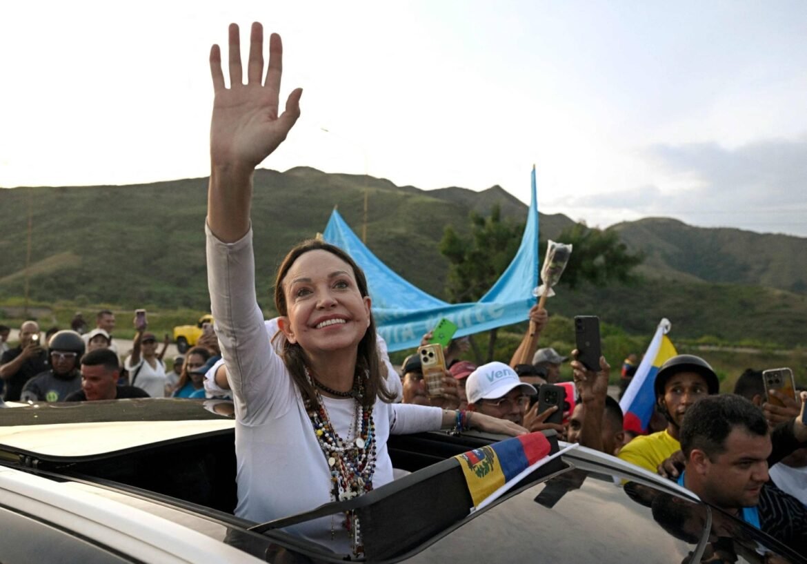 Machado returns to Venezuela to urge democratic transition
