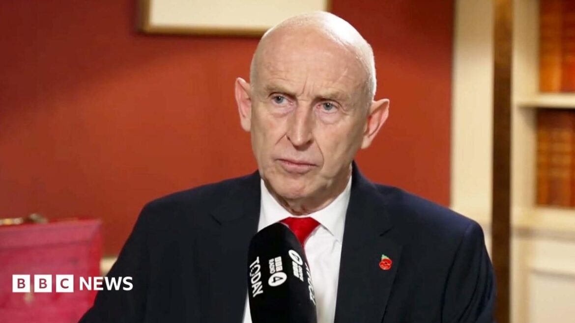 Thin, red banner promoting the Politics Essential newsletter with text saying, “Top political analysis in your inbox every day”. There is also an image of the Houses of Parliament.