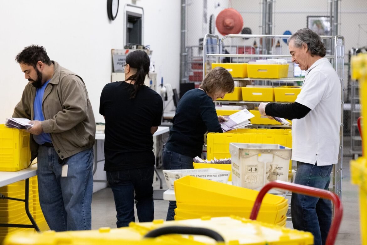 Election workers sort ballots at an election operations facility in Martinez, California, on May 27, 2026, ahead of California's statewide primary election. (Photo by Benjamin Fanjoy/Getty Images)