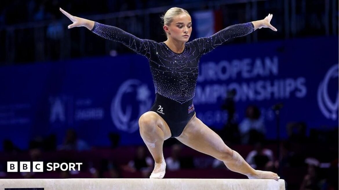 Ruby Evans competing on the balance beam in the 2026 European Championships